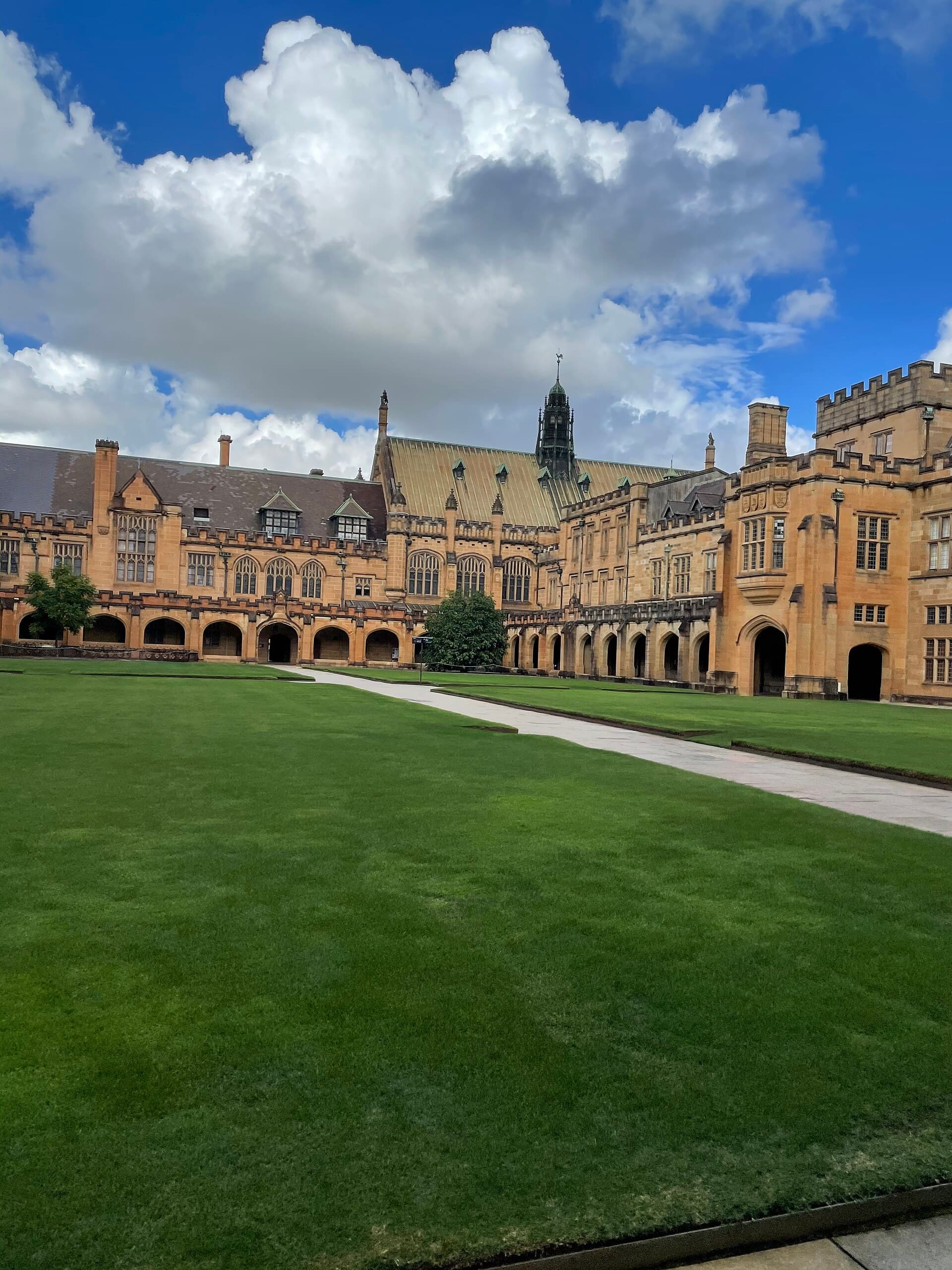 Collegiate sandstone quadrangle — atmospheric photograph for the boarding-schools guide